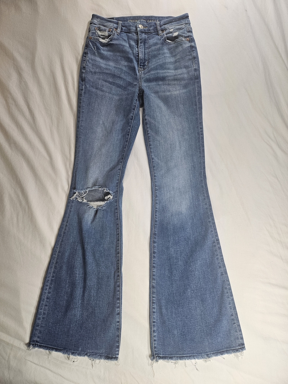 American Eagle Outfitters Medium Blue Flare Jeans with Knee Rip